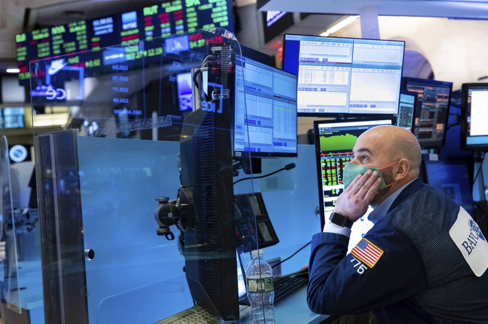 A trader works on the trading floor of the New York Stock Exchange, U.S., Jan. 26, 2022. (AP Photo)