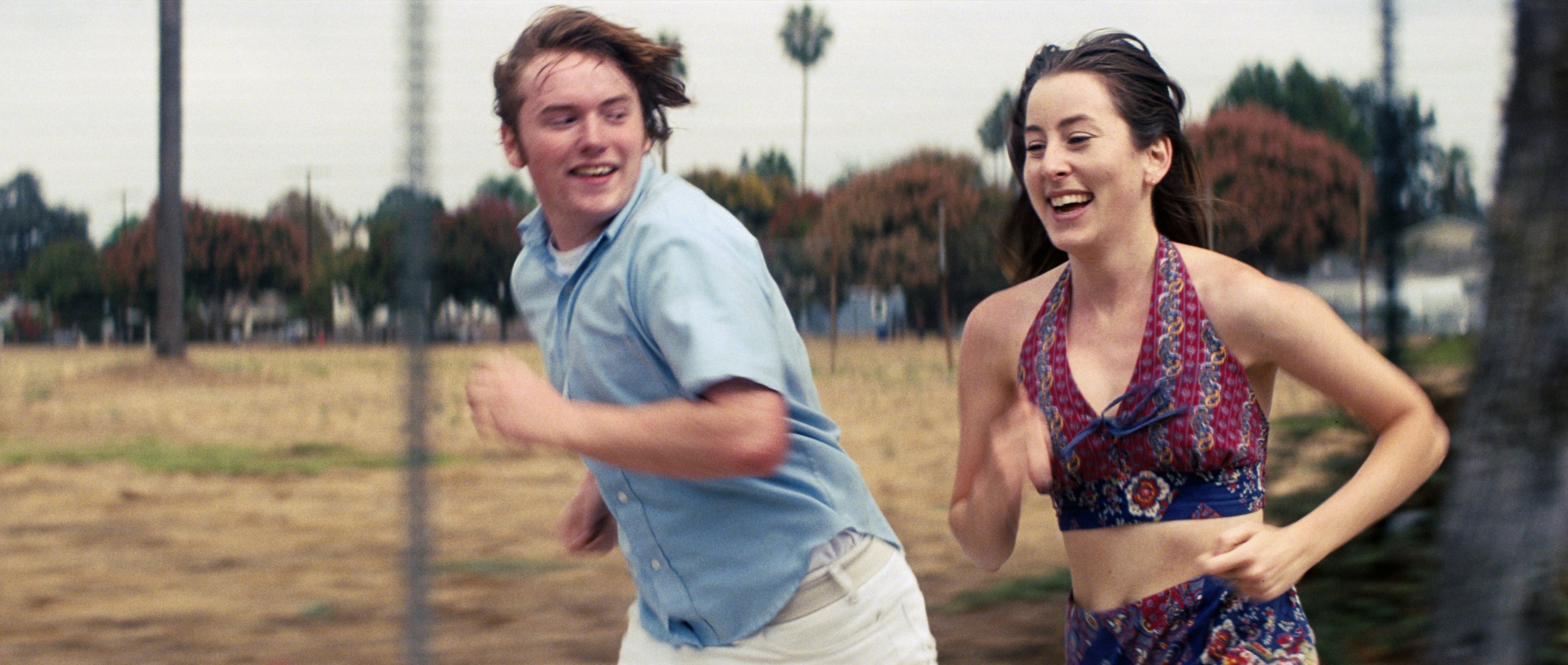 This image released by MGM shows Cooper Hoffman (L) and Alana Haim in a scene from 