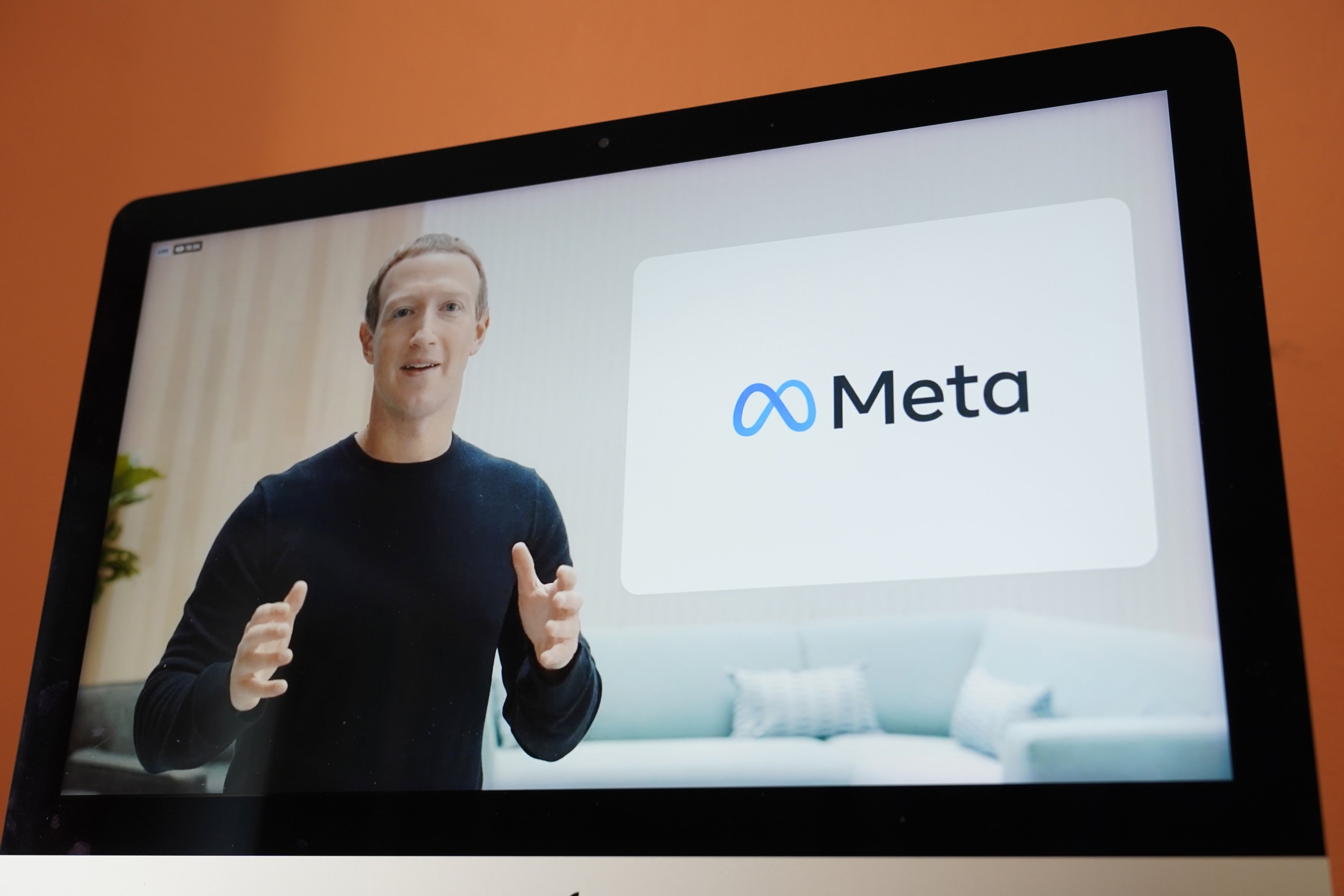Facebook CEO Mark Zuckerberg is seen on the screen of a device in Sausalito, California, during a virtual event to announce the rebrand of Facebook as Meta, Oct. 28, 2021. (AP Photo)