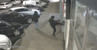 Video footage of the attack shows an attacker kicking the mosque's door, Vienna, Austria, Feb. 3, 2022. (IHA Photo)