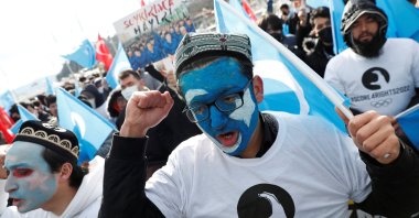 People from China's Uyghur Muslim ethnic group shout slogans during a rally against the 2022 Beijing Winter Olympic Games over China's treatment of the minority, Istanbul, Turkey, Feb. 4, 2022. (Reuters Photo)