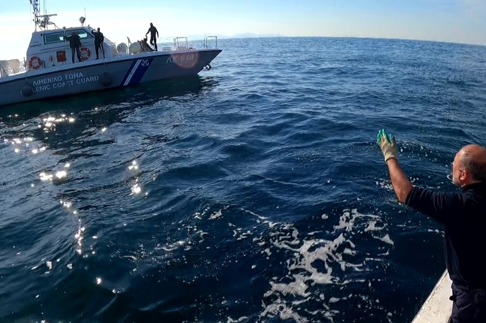A scene from the video footage shows Turkish fisherman İlker Özdemir being harassed by the Greek coast guard in international waters off Turkey&#039;s Gökçeada island, Feb. 3, 2022. (AA Photo)