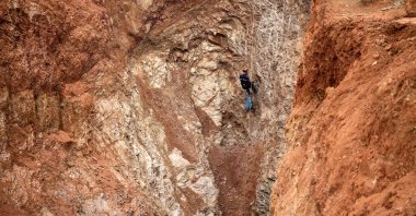 A Moroccan emergency services climber works to rescue a 5-year-old boy, Rayan, who fell into a well on Feb. 1, in the remote village of Ighrane in the rural northern province of Chefchaouen, Morocco, Feb. 4, 2022. (AFP Photo)