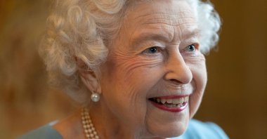 Britain's Queen Elizabeth attends a reception with representatives from local community groups to celebrate the start of the Platinum Jubilee, at the Ballroom of Sandringham House, which is the Queen's Norfolk residence, in Sandringham, Britain, Feb. 5, 2022. (Joe Giddens/Pool via REUTERS)