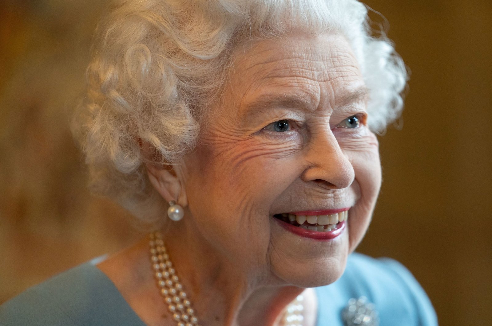 Britain&#039;s Queen Elizabeth attends a reception with representatives from local community groups to celebrate the start of the Platinum Jubilee, at the Ballroom of Sandringham House, which is the Queen&#039;s Norfolk residence, in Sandringham, Britain, Feb. 5, 2022. (Joe Giddens/Pool via REUTERS)