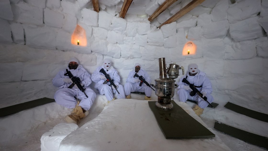 Security forces are seen inside the igloo during the snow festival in eastern Turkey's Hakkari, Feb. 6, 2022. (AA Photo)