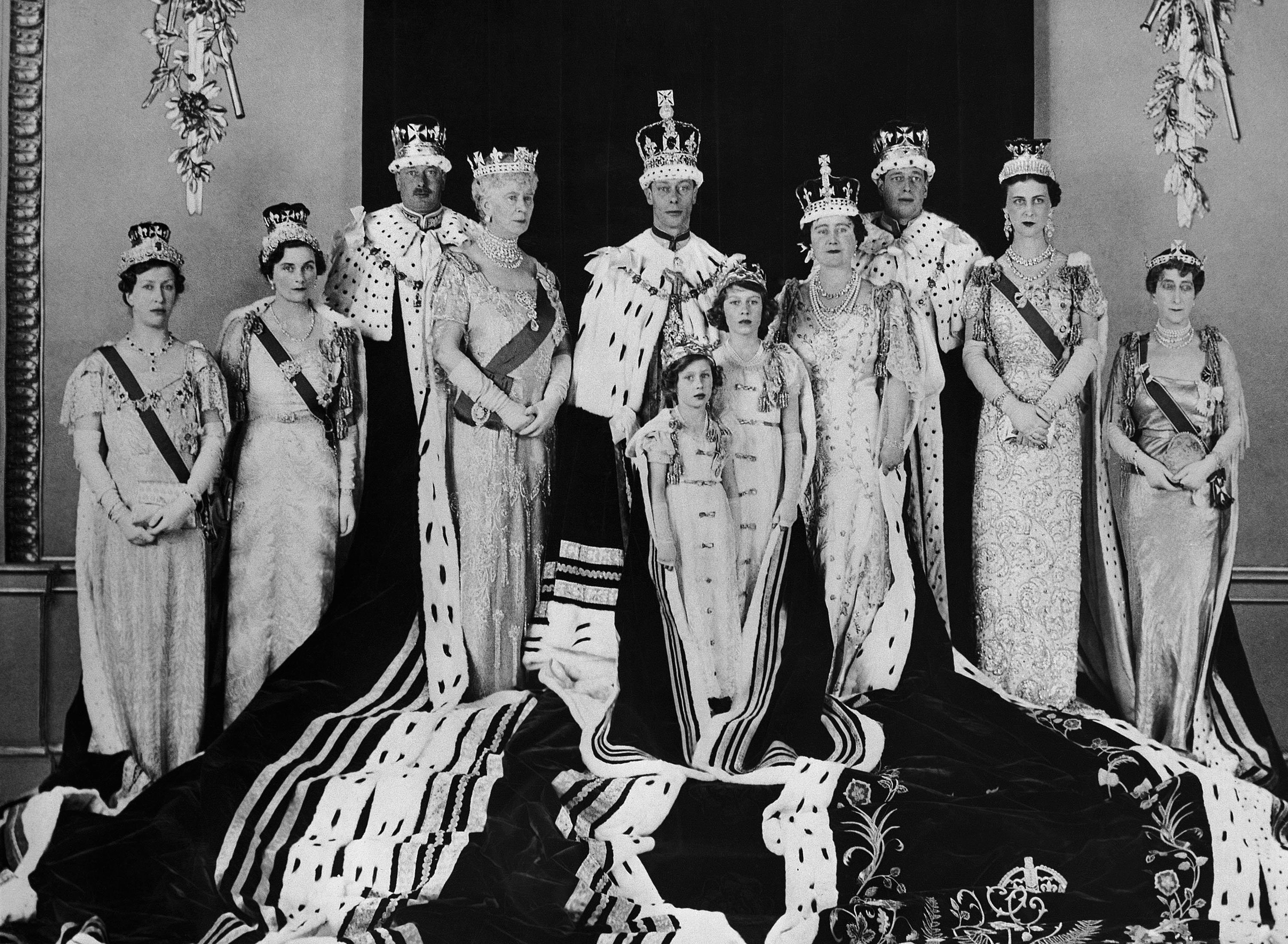 King George VI (C), poses with his wife Queen Elizabeth (C-R), daughters Princess Elizabeth and Margaret, along with members of the family, after his coronation, in London, U.K., May 15, 1937. (AP Photo)
