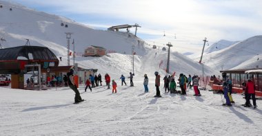 Tourists are seen while skiing at Erzurum's Palandöken ski resort in eastern Turkey, Feb. 2, 2022 (AA Photo)