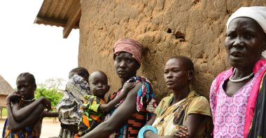 In this Oct. 4, 2017, file photo, women and children pose for a picture in Terekeka, South Sudan. (AP Photo)