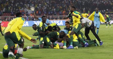 Senegal players celebrate winning the penalty shoot out against Egypt in the final of Africa Cup of Nations at Olembe Stadium, Yaounde, Cameroon, Feb. 6, 2022. (Reuters Photo)