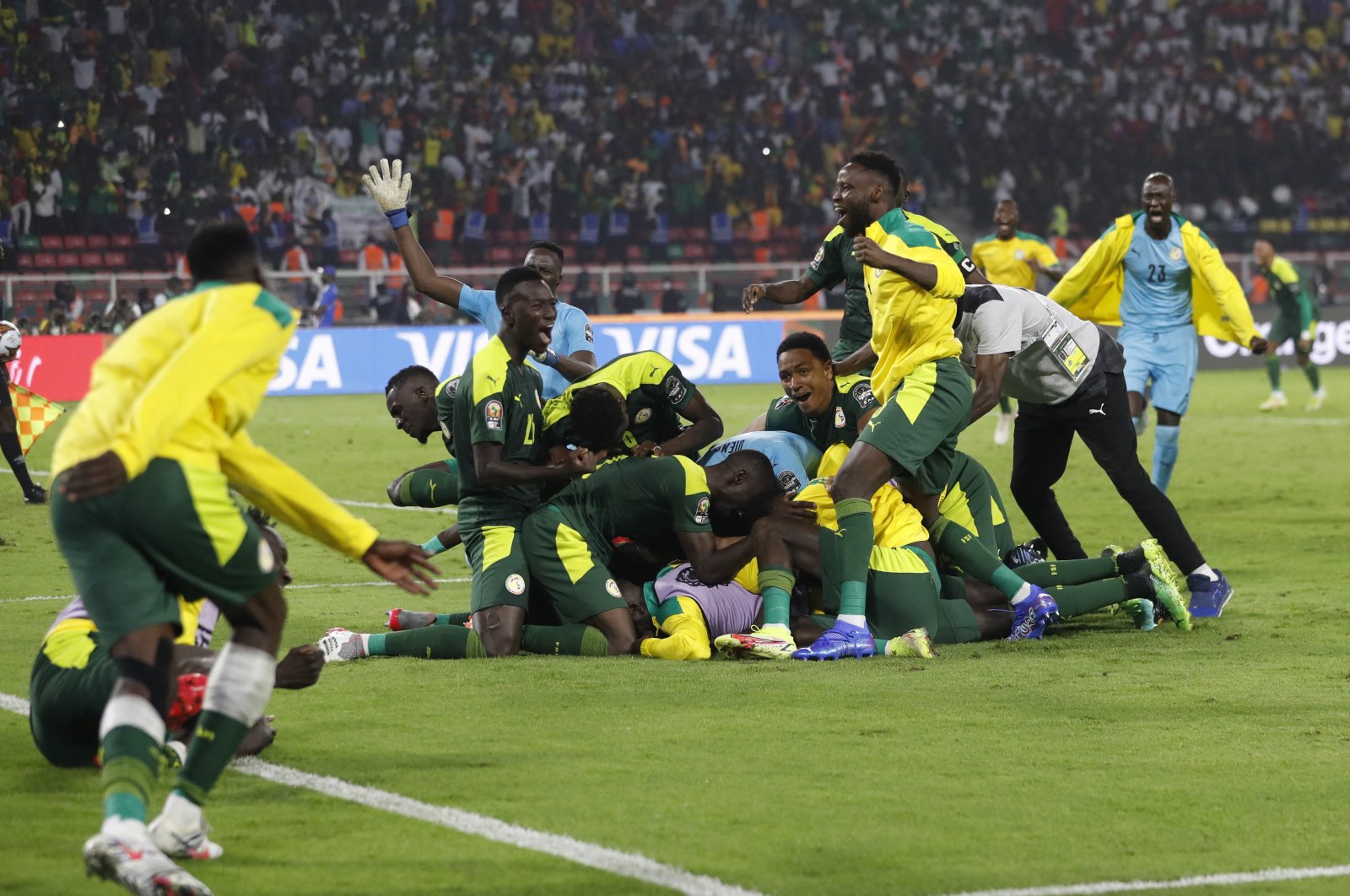 Senegal players celebrate winning the penalty shoot out against Egypt in the final of Africa Cup of Nations at Olembe Stadium, Yaounde, Cameroon, Feb. 6, 2022. (Reuters Photo)