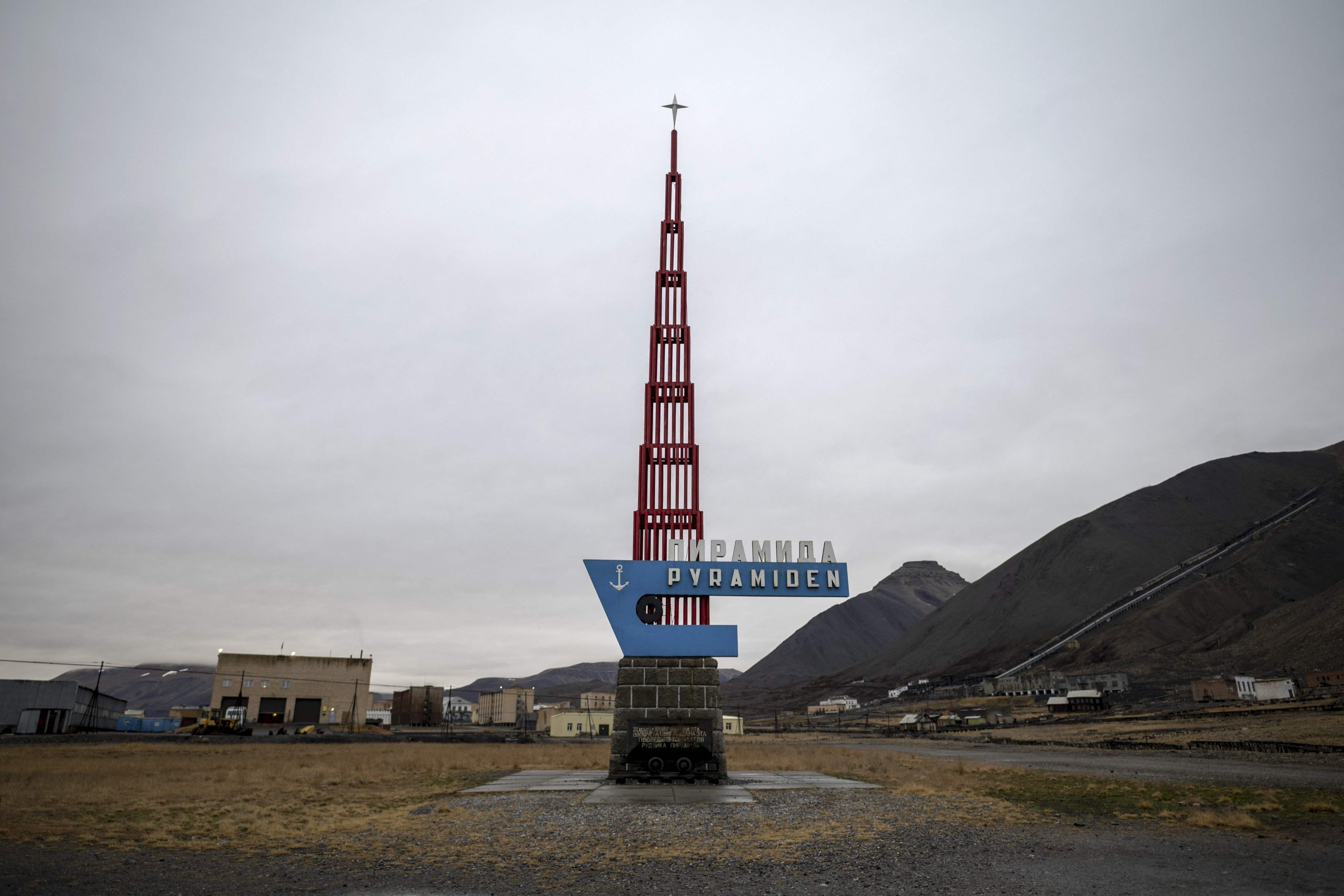 A monument stands at the entrance of the abandoned ex-soviet mining village of Pyramiden, in Svalbard, Norway, Sept. 21, 2021. (AFP Photo)
