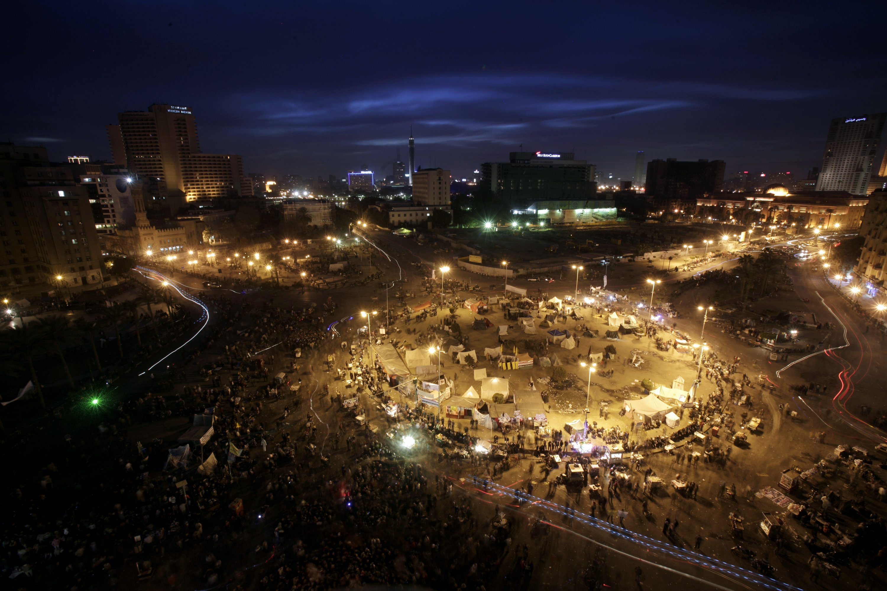 Egyptian protesters gather to mark the anniversary of the start of the revolt that swept aside former President Hosni Mubarak, in Tahrir Square, Cairo, Egypt, Feb. 3, 2012. (AP Photo)