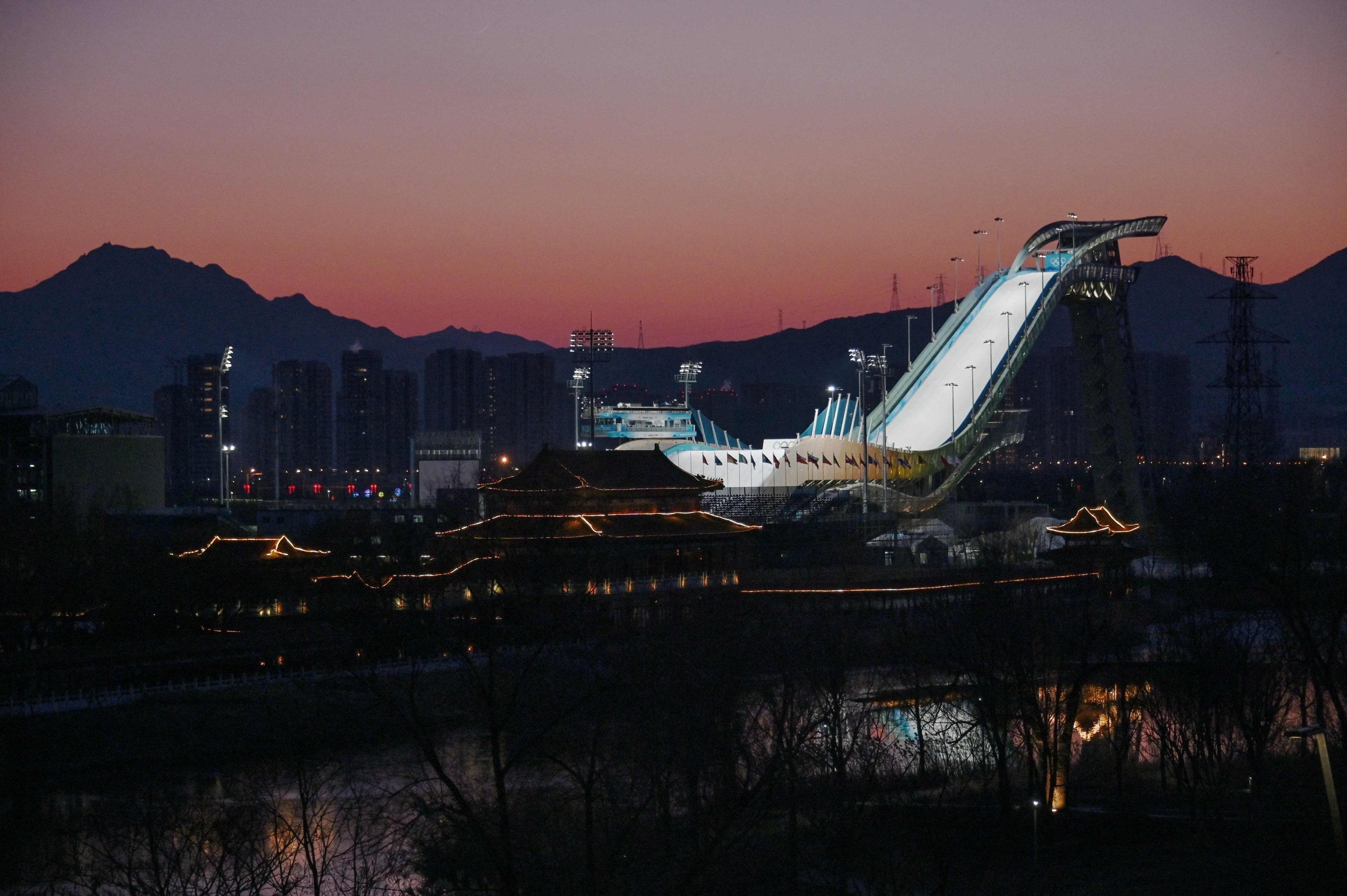The Shougang Big Air venue, which will host the big air freestyle skiing and snowboarding competitions at the Beijing 2022 Winter Olympics, is seen during sunset at the Shougang Park, Beijing, China, Feb. 2, 2022. (AFP Photo)