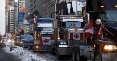 Trucks line a street in Bloor near Yorkville, Toronto, Canada, Feb. 5, 2022. (Getty Images via AFP)