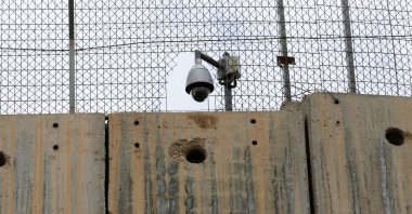 An Israeli security camera is seen on a section of the Israeli barrier in Bethlehem, in the occupied West Bank, Palestine, Feb. 1, 2022. (Reuters Photo)