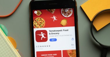 The Yemeksepeti mobile app is seen on a phone screen close up. (Shutterstock Photo)