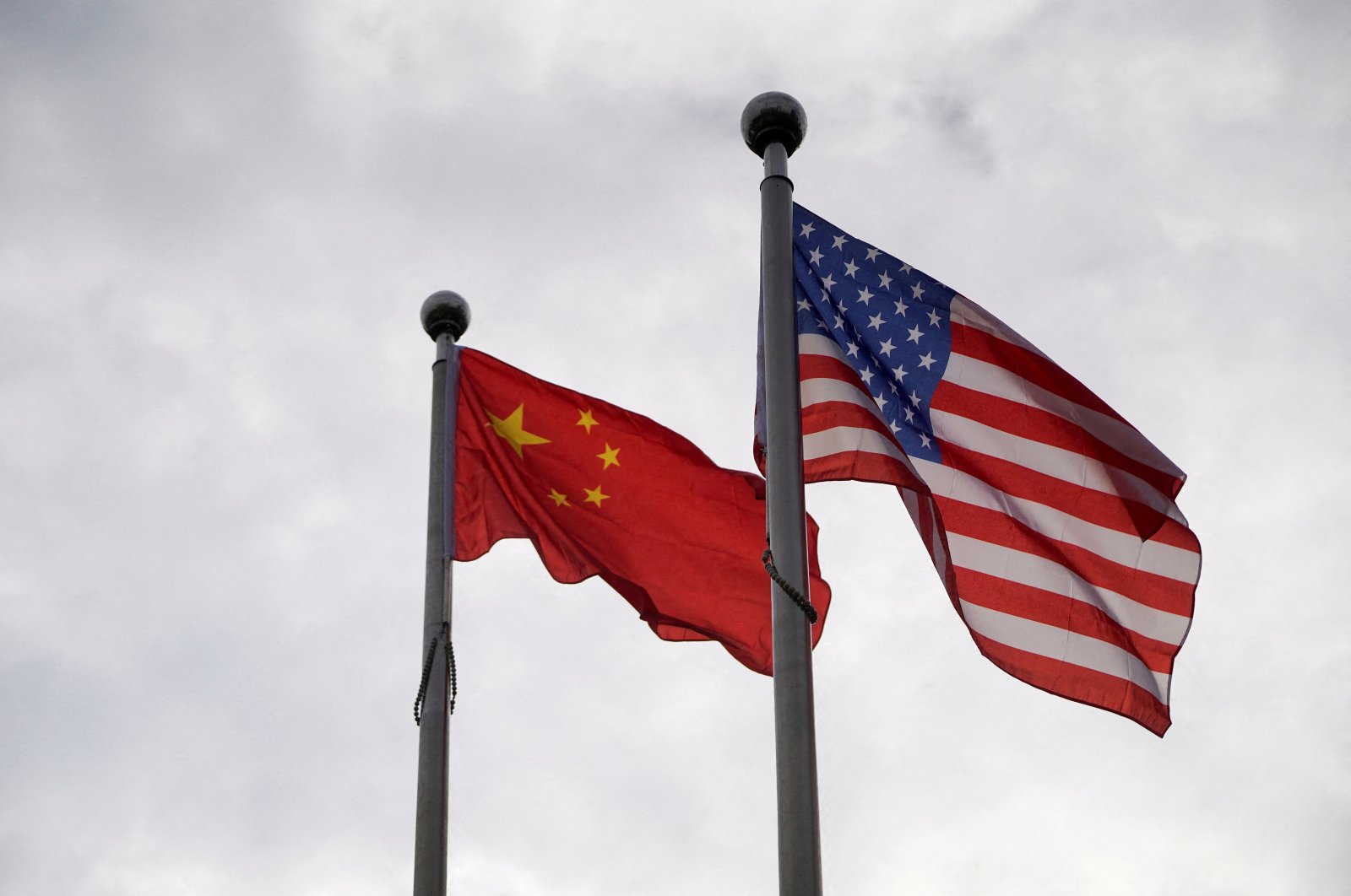 Chinese and U.S. flags flutter outside a company building in Shanghai, China, Nov. 16, 2021. (Reuters Photo)