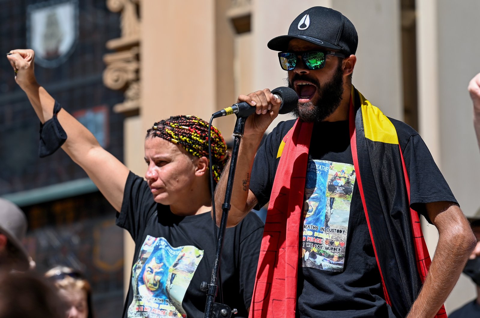Indigenous activist and proud Dunghutti, Gumbaynggirr, Bundjalung woman Lizzy Jarret (L) and Paul Silva (R), a nephew of David Dungay Jr., speak during a rally on Australia Day. Australia&#039;s Indigenous peoples see the day marking the beginning of the colonization of their people and land and refer to it as &quot;Invasion Day,&quot; Sydney, Australia, Jan. 26, 2022.  (EPA Photo)