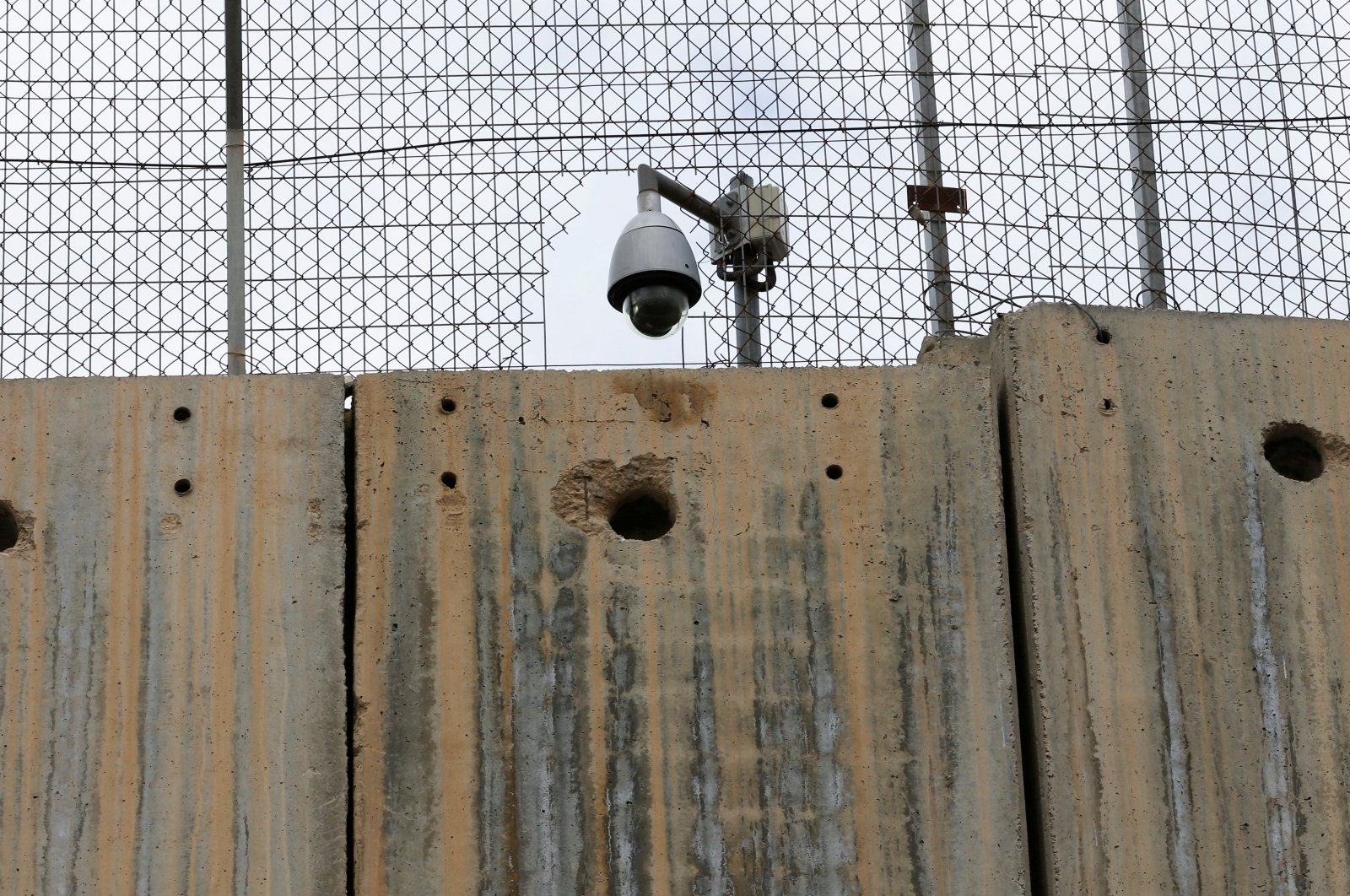 An Israeli security camera is seen on a section of the Israeli barrier in Bethlehem, in the occupied West Bank, Palestine, Feb. 1, 2022. (Reuters Photo)