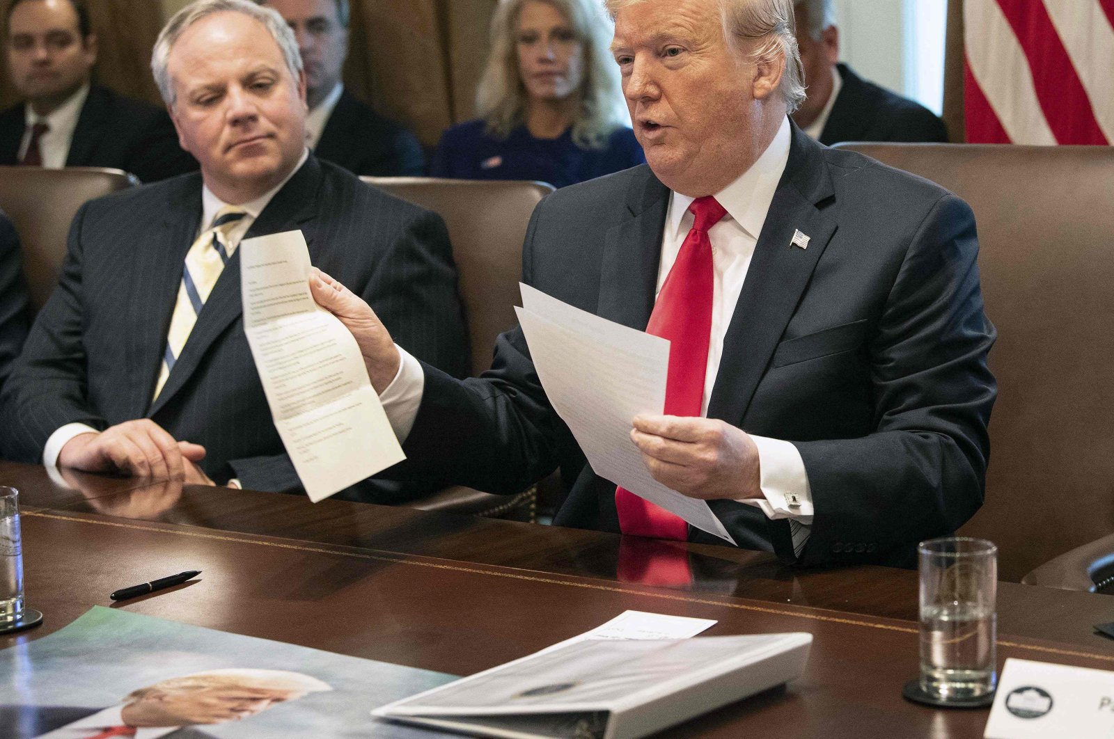 In this file photo, former U.S. President Donald Trump shows a letter he said was from North Korean leader Kim Jong Un during a Cabinet meeting at the White House in Washington, D.C., Jan. 2, 2019. (Photo via AFP)