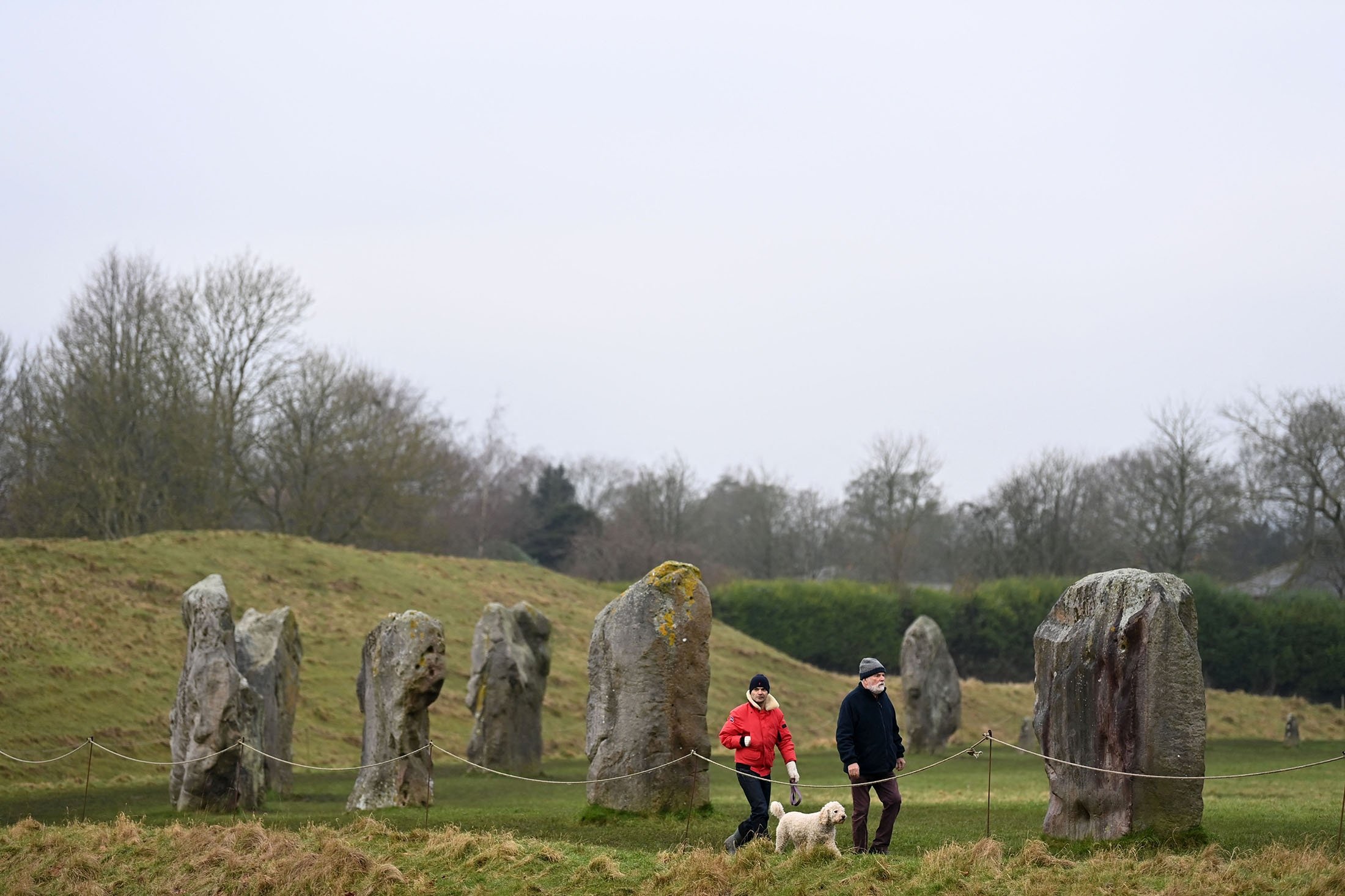 People visit the Stone Circle in Avebury, southern England, Jan. 19, 2022. (AFP Photo)