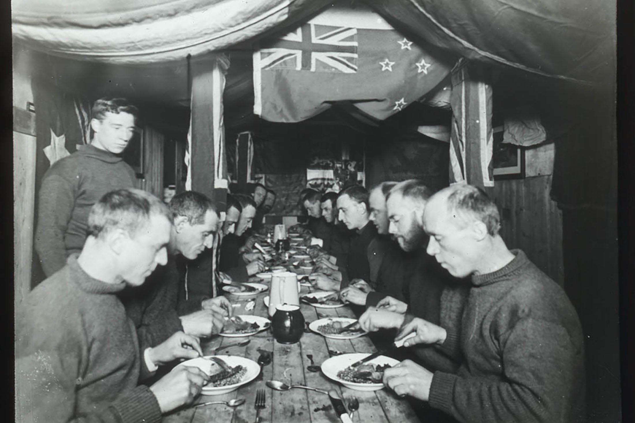 Sir Ernest Shackleton's party at dinner. (Photo courtesy of New South Wales State Library)