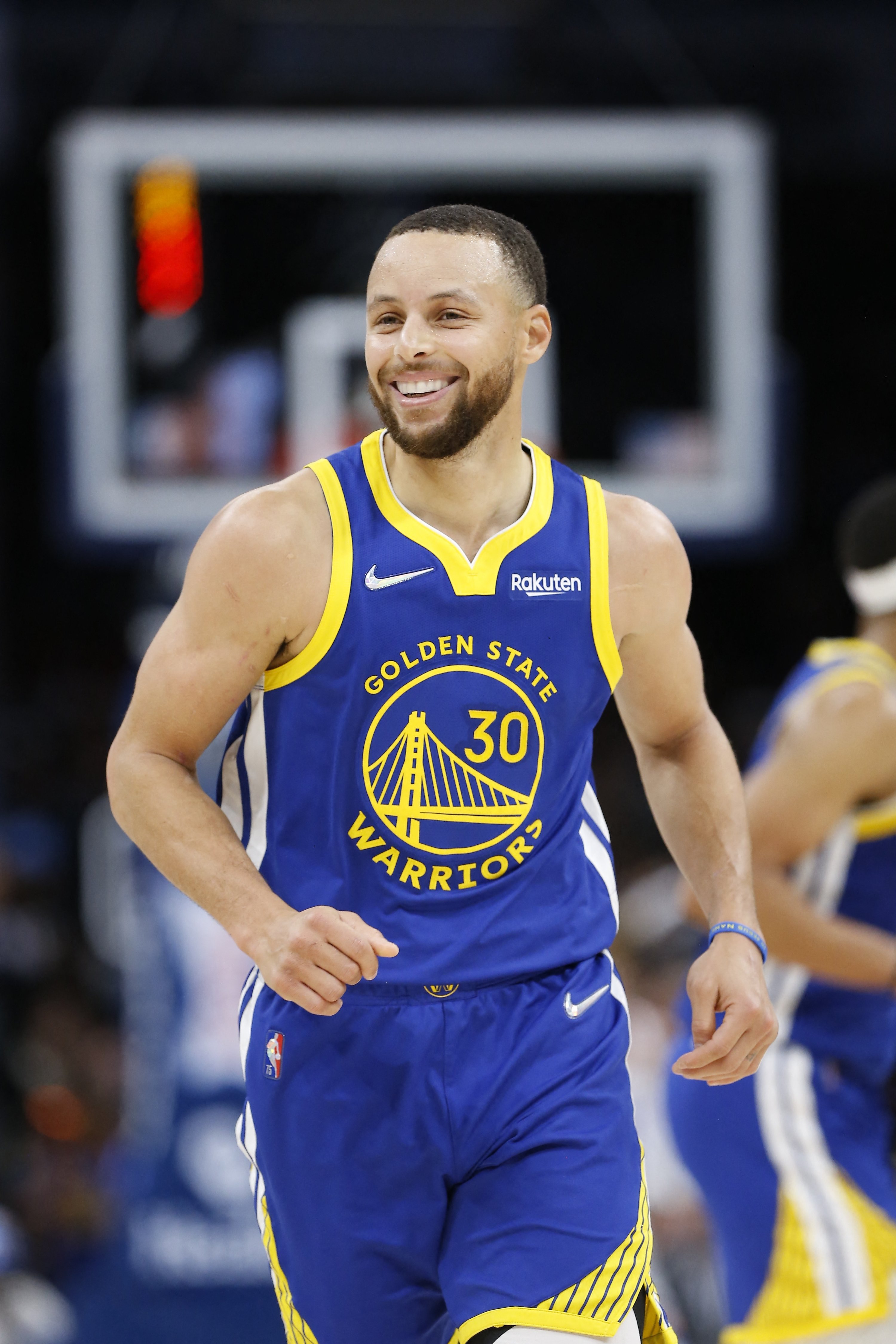 Golden State Warriors guard Stephen Curry smiles after scoring in an NBA game against the Oklahoma City Thunder, Oklahoma City, Oklahoma, U.S., Feb 7, 2022. (Reuters Photo)