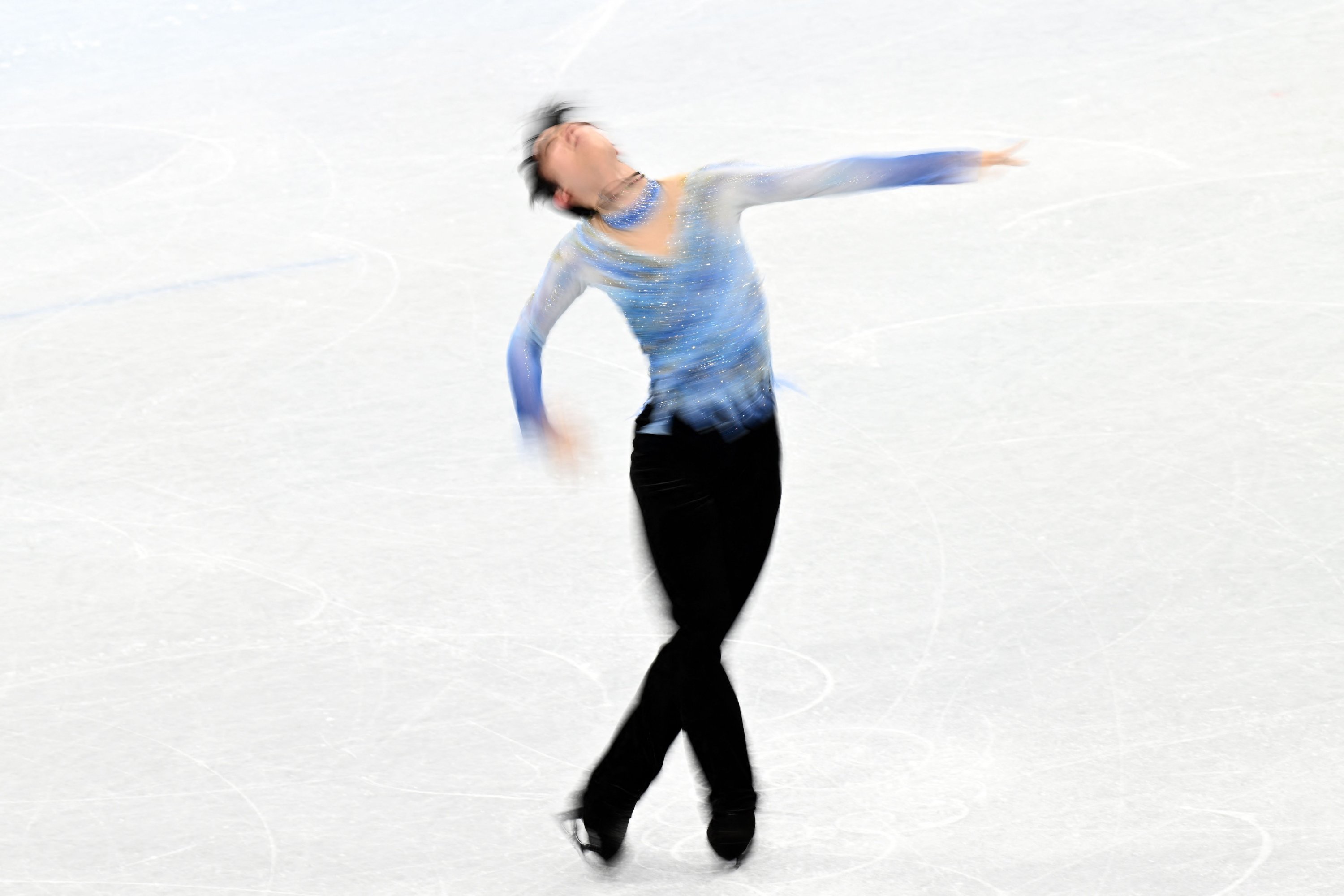 Japan's Yuzuru Hanyu competes in the Beijing 2022 Winter Olympic Games men's single skating short program of the figure skating event, Beijing, China, Feb. 8, 2022. (AFP Photo)