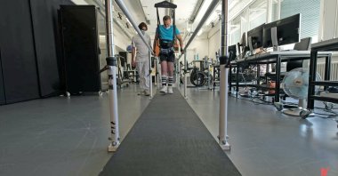 A 42-year-old patient trains on a weight-supporting machine at Lausanne University Hospital after having received a spinal cord implant as part of the STIMO Bridge research, in this undated handout photo taken in Lausanne, Switzerland. (NeuroRestore/Jimmy Ravier via Reuters)