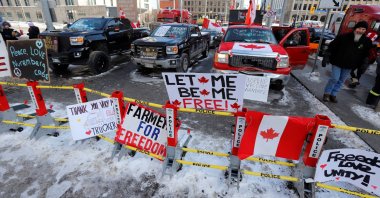 Signs sit on a police baracade as truckers and their supporters continue to protest coronavirus disease (COVID-19) vaccine mandates, in Ottawa, Ontario, Canada, Feb. 7, 2022. (Reuters Photo)