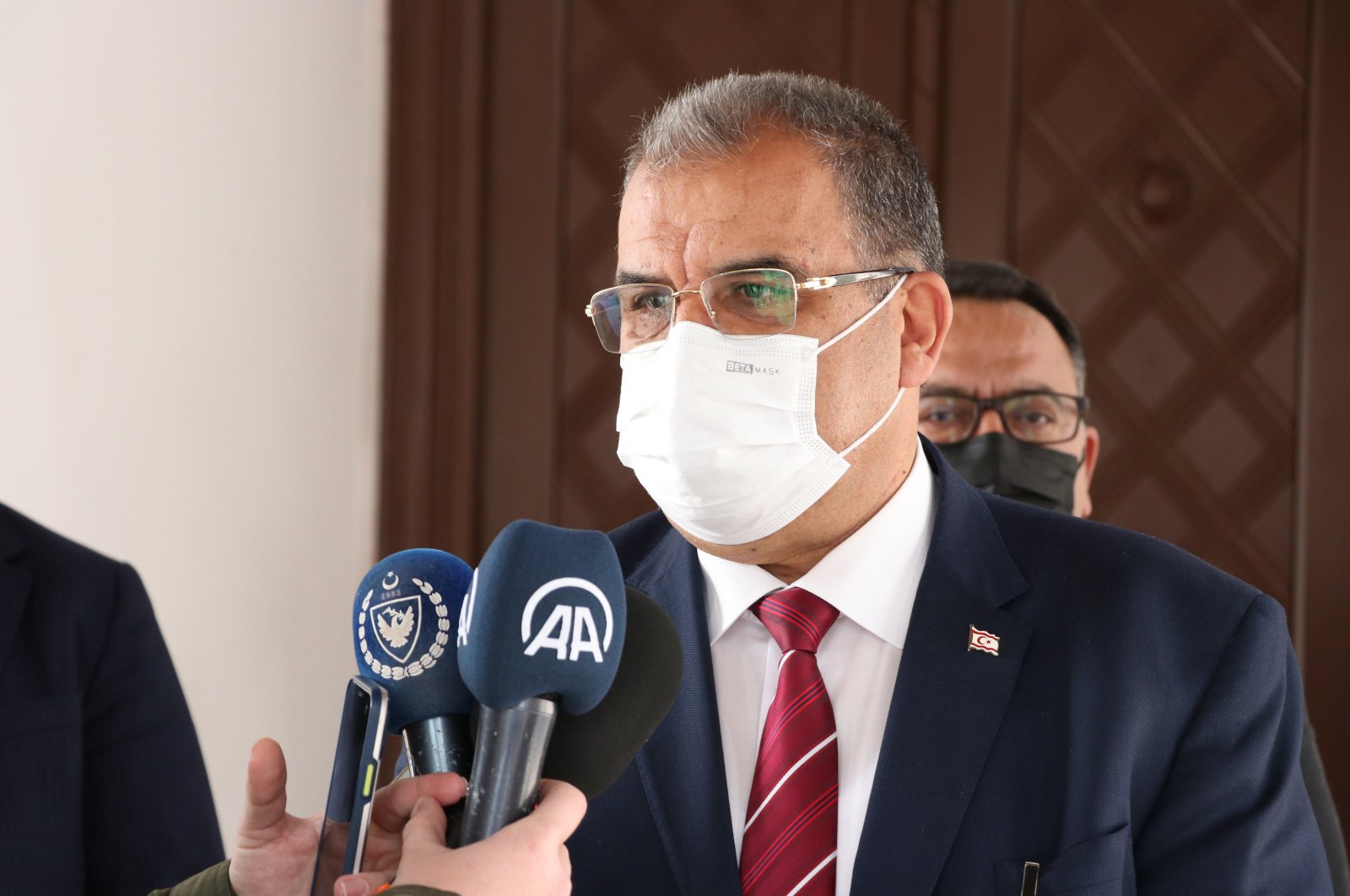Turkish Republic of Northern Cyprus (TRNC) Prime Minister Faiz Sucuoğlu speaks to reporters in Lefkoşa (Nicosia), TRNC, Feb. 7, 2022. (AA Photo)