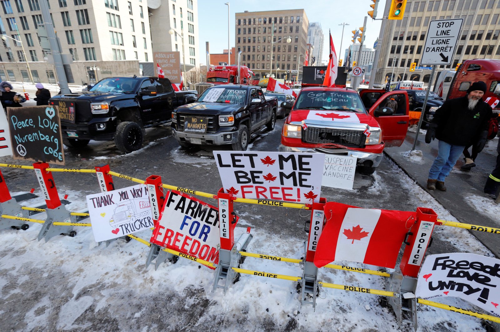 Signs sit on a police baracade as truckers and their supporters continue to protest coronavirus disease (COVID-19) vaccine mandates, in Ottawa, Ontario, Canada, Feb. 7, 2022. (Reuters Photo)