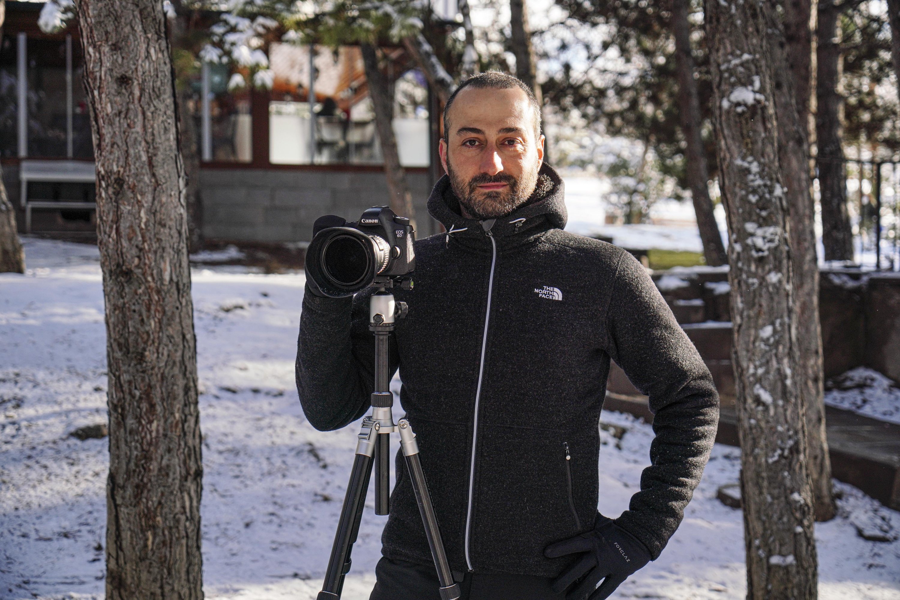 Aytek Çetin with his camera and tripod, Ankara, Turkey, Feb. 5, 2022. (DHA Photo)