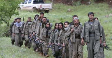 PKK terrorists walk on the way to their new base in northern Iraq, May 14, 2013. (Reuters File Photo)