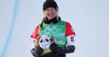 U.S.&#039; Lindsey Jacobellis celebrates after winning gold in women&#039;s snowboard cross big final, Zhangjiakou, China, Feb. 9, 2022. (Reuters Photo)