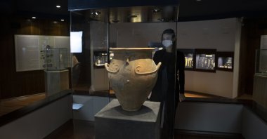 An item of pottery found in the Limantepe mound and featuring a depiction of a human face on display at Izmir Archaeology Museum, western Turkey, Feb. 8, 2022. (AA)
