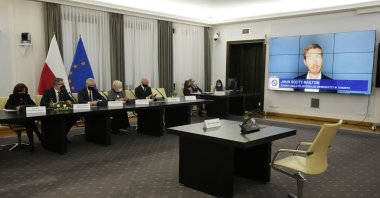 A Polish Senate commission heard the testimony of two cybersecurity experts, John Scott-Railton and Bill Marczak, senior researchers with the Citizen Lab, a research group based at the University of Toronto, in Warsaw, Poland, Jan. 17, 2022. (AP Photo)