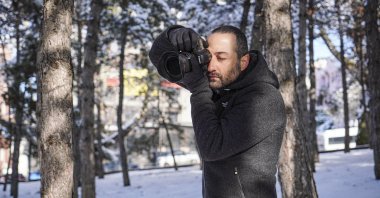 Aytek Çetin in action in the woods in Ankara with the camera he used to take the photos that crowned him "Landscape Photographer of the Year" in Australia, Ankara, Turkey, Feb. 5, 2022. (DHA Photo)