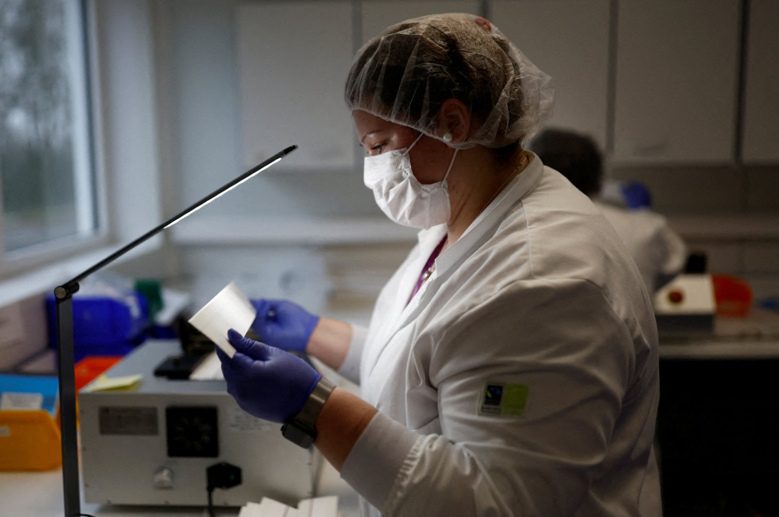 An employee works at the NG Biotech factory, which produces COVID-19 tests, in Guipry-Messac, France, Jan. 12, 2022. (Reuters Photo)