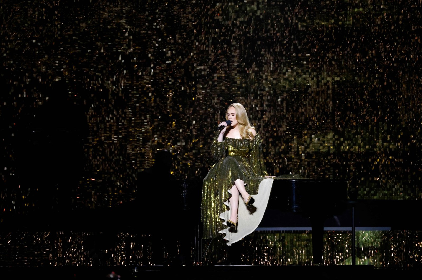 British singer Adele Laurie Blue Adkins, aka Adele, performs during the BRIT Awards 2022 ceremony and live show in London, Britain, Feb. 8, 2022. (AFP)