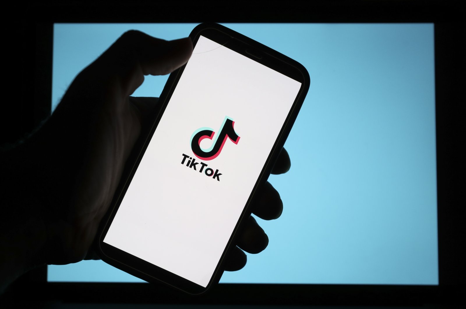 TikTok logo on a phone display. (AA Photo) 