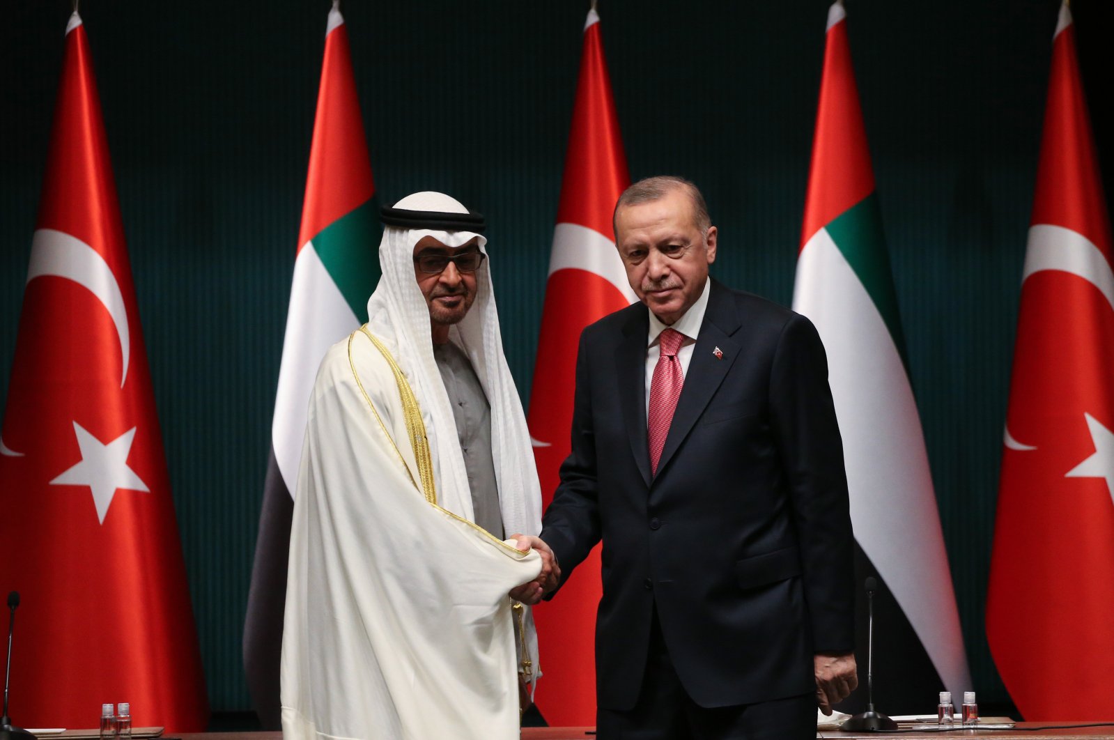 President Recep Tayyip Erdoğan shakes hands with Crown Prince of the Emirate of Abu Dhabi, Sheikh Mohammed bin Zayed Al Nahyan (L) during an agreement ceremony after their meeting at the Presidential Complex in Ankara, Turkey, Nov. 24, 2021. (EPA File Photo)