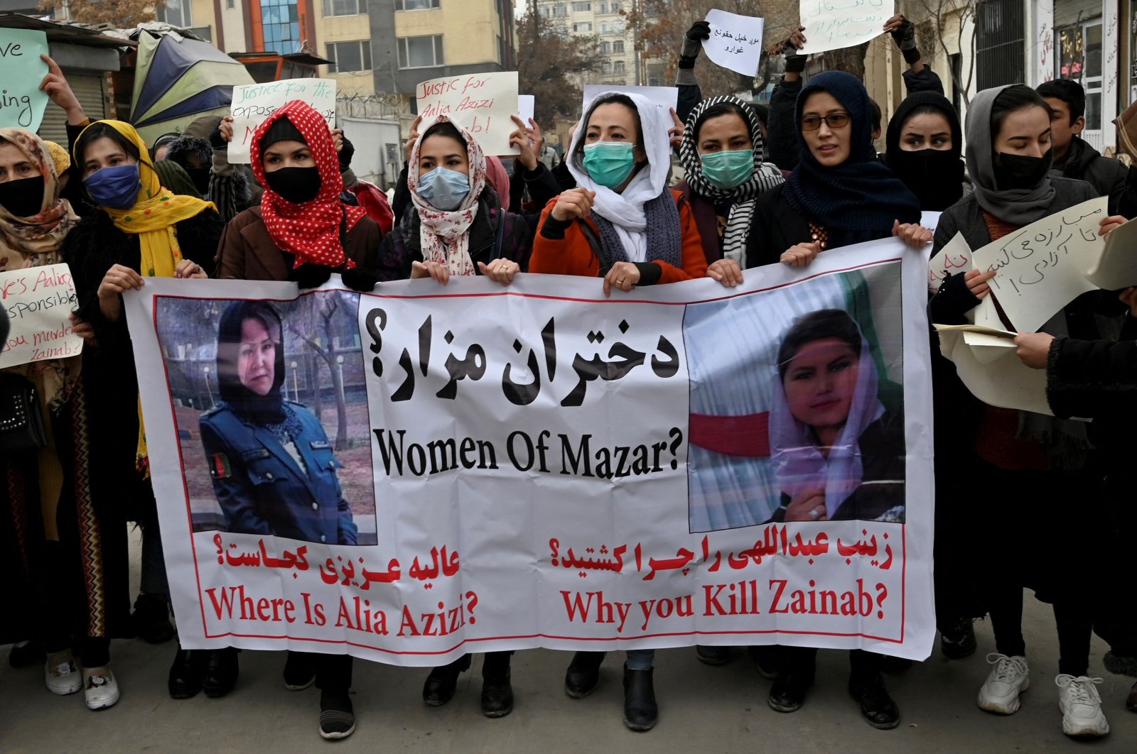 Afghan women chant slogans and hold banners during a women&#039;s rights protest march in Kabul, Afghanistan, Jan. 16, 2022. (AFP Photo)
