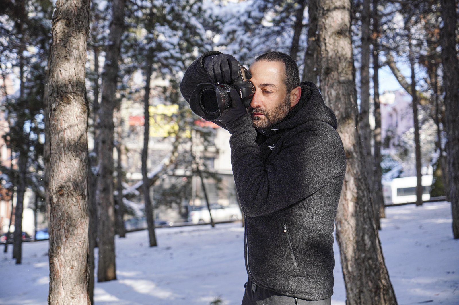Aytek Çetin in action in the woods in Ankara with the camera he used to take the photos that crowned him "Landscape Photographer of the Year" in Australia, Ankara, Turkey, Feb. 5, 2022. (DHA Photo)