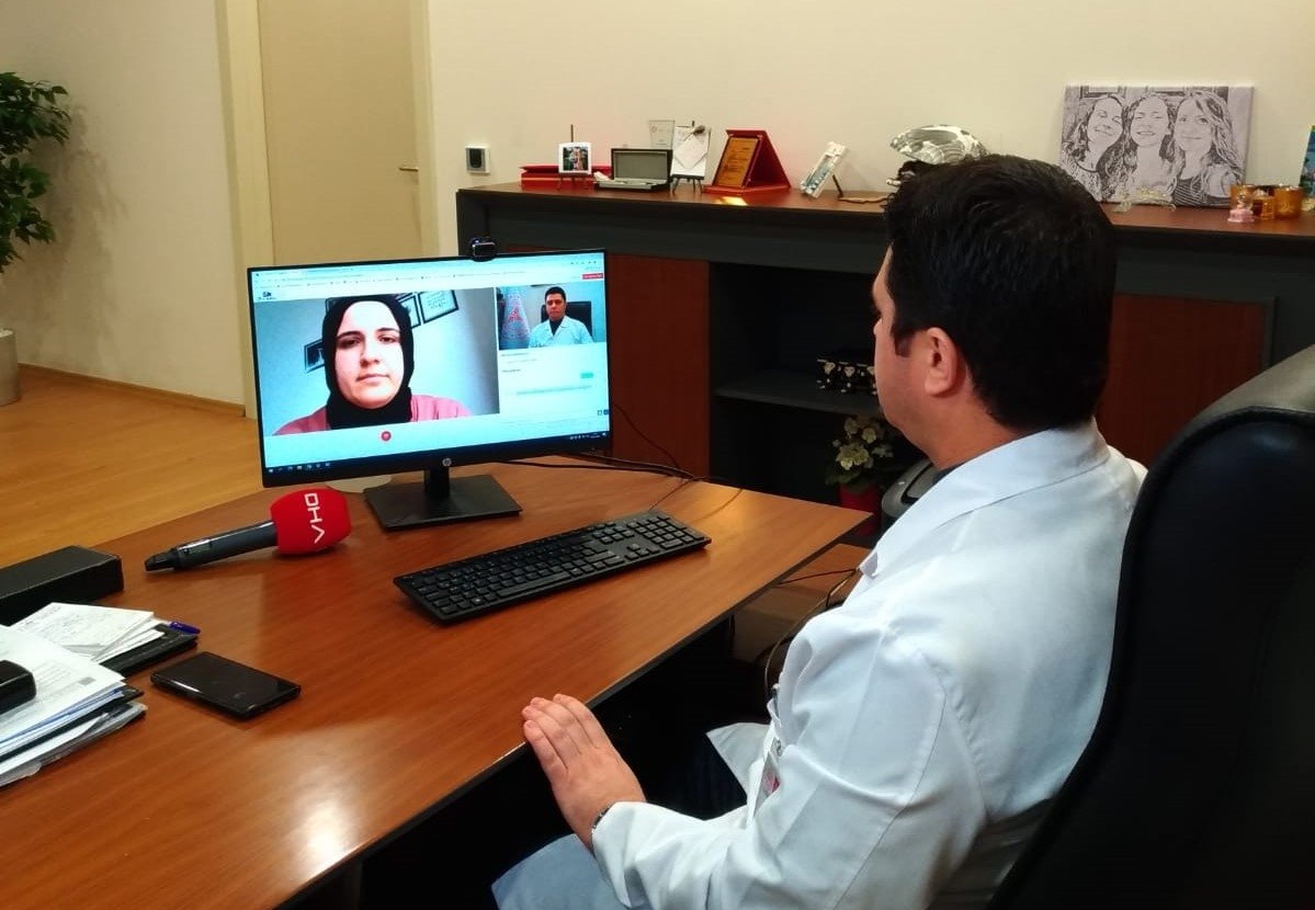 Dr. Erhan Eken during a video call with a patient, in Istanbul, Turkey, Feb. 10, 2022. (DHA PHOTO)