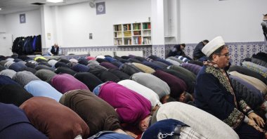 Muslim believers pray in a mosque for the victims of the shooting in Hanau, Germany, Feb. 21, 2020. (AP File Photo)