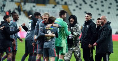 Beşiktaş players celebrate the victory during the Turkish Cup Round of 16 match at the Vodafone Park in Istanbul on Feb. 11, 2022 (AA Photo)