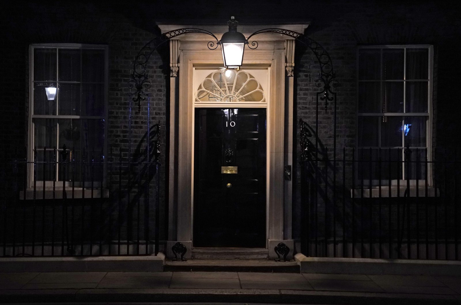 A light over the 10 Downing Street door in London, the U.K., Feb. 3, 2022. (Reuters Photo)