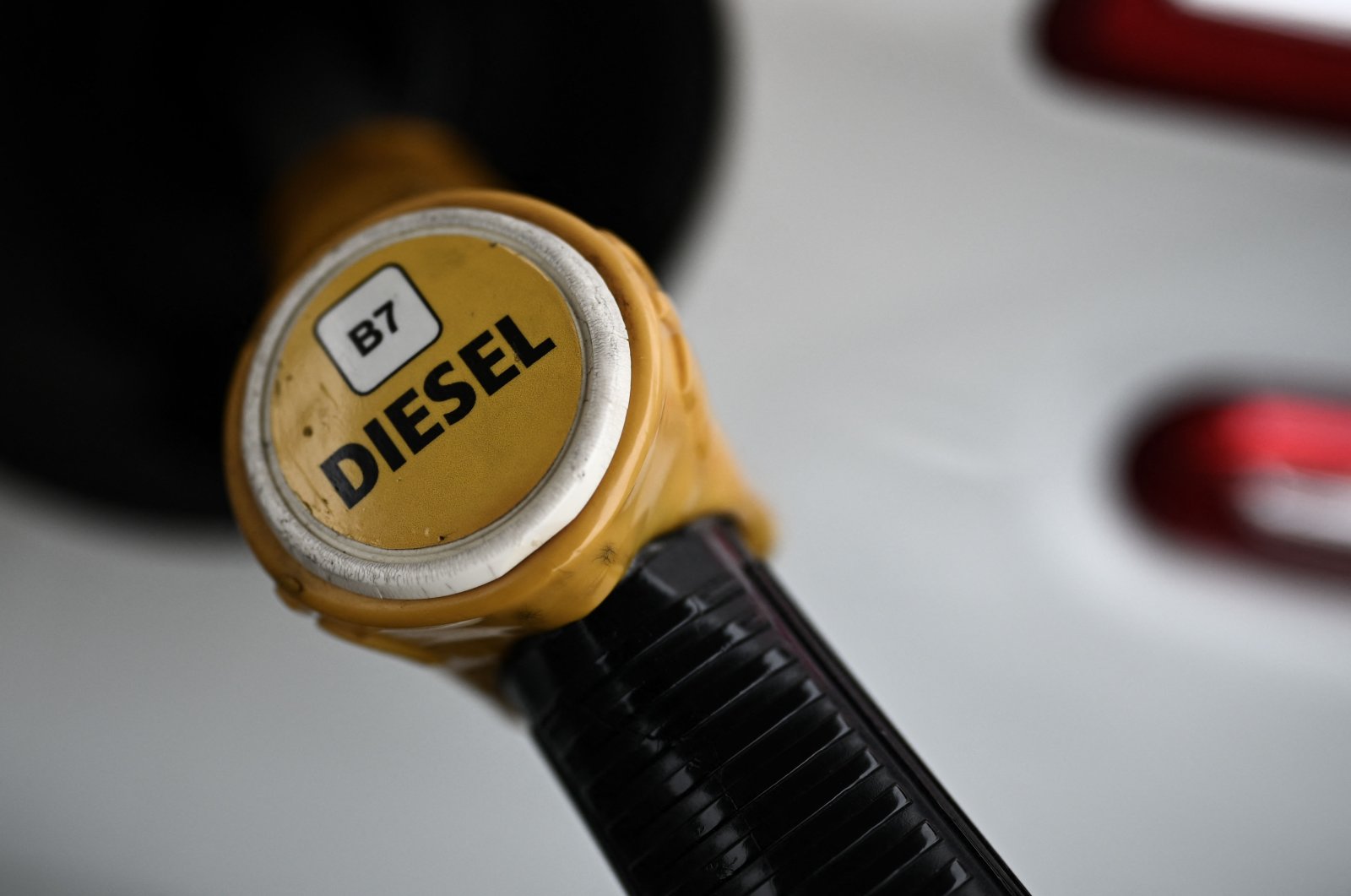 A photograph shows a diesel nozzle at a petrol station in Bordeaux, southwestern France, Jan. 18, 2022. (AFP Photo)